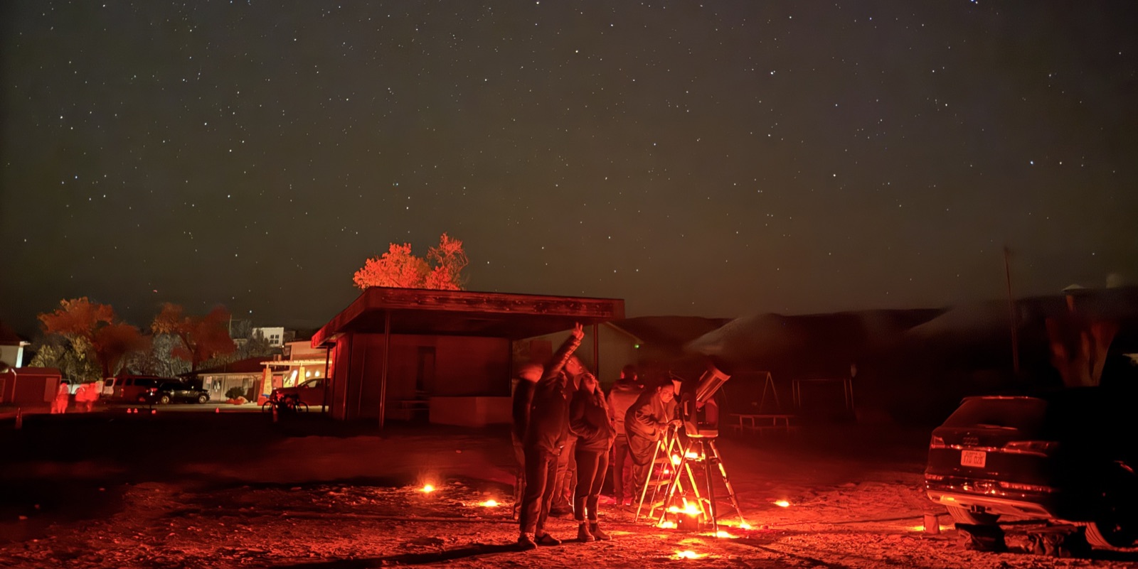 The night sky above Bryce Canyon on a festival night, stars visible over the canyon rim